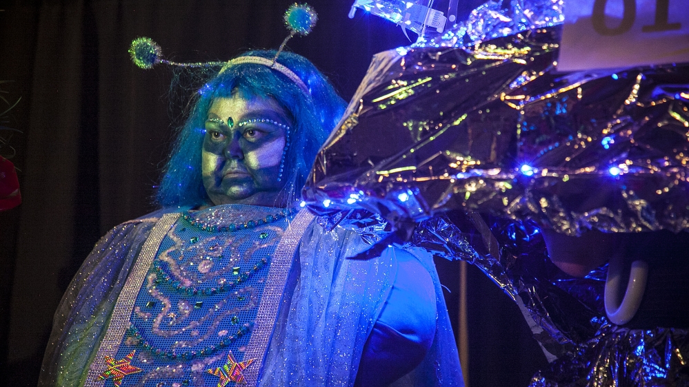 Attendees compete with elaborate extraterrestrial-themed costumes at one event at the UFO Festival in Roswell, New Mexico [Gabriela Campos/Al Jazeera]