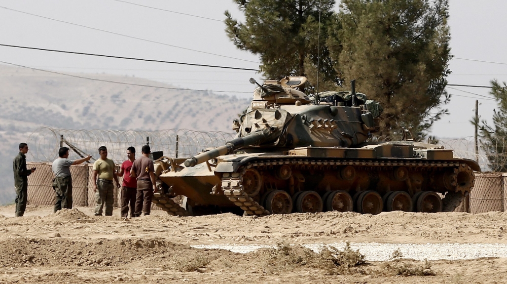 Turkey views the YPG as a threat because of its close links to the  PKK [Sedat Suna/EPA]