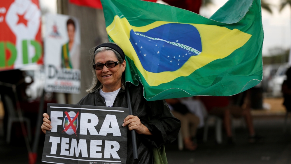 Rousseff was greeted by cheering supporters as she arrived at the Senate [Bruno Kelly/Reuters]