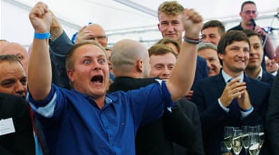 People react to first exit polls during the Mecklenburg-Vorpommern state election at the anti-immigrant AfD post-election venue in Schwerin, Germany, September 4 [Reuters]