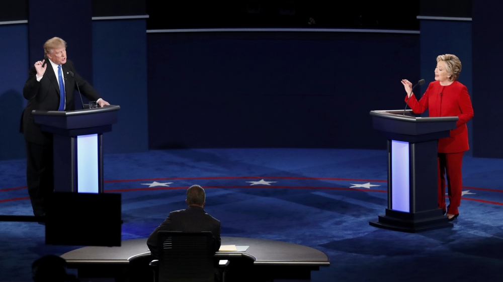 Democratic U.S. presidential nominee Hillary Clinton and Republican U.S. presidential nominee Donald Trump speak during their first presidential debate at Hofstra University in Hempstead
