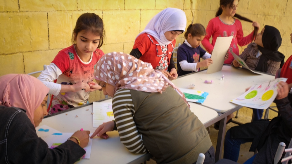 
Focusing mostly on drawing, theatre and music, the centre also offers language training in Arabic and English [Megan O’Toole/Al Jazeera]
