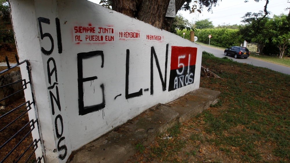 A graffiti, of rebel group Army Liberation National (ELN) is seen at the entrance of the cemetery of El Palo, Cauca, Colombia
