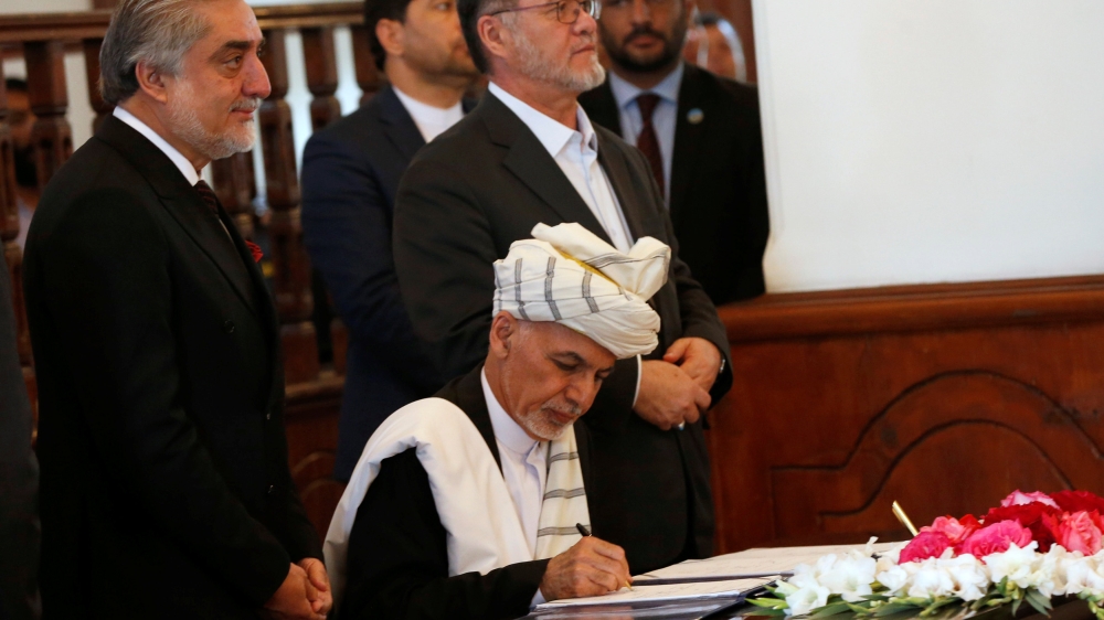 Afghan President Ashraf Ghani, signs a peace agreement with Hizb-i-Islami, led by Gulbuddin Hekmatyar, in Kabul