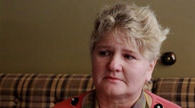 Olena Sugak says that until a body is found, she will never stop the search for her son [Matthew Vickery/Al Jazeera]