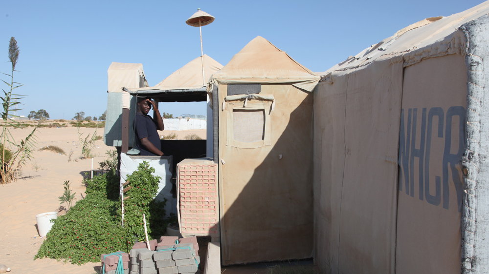 Mamadou Sylla says he does not understand why these refugees were not given asylum by UNHCR [Thessa Lageman/Al Jazeera] 