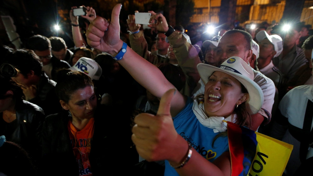Supporters of "No" vote celebrate after the nation voted "NO" in a referendum on a peace deal between the government and FARC rebels in Bogota, Colombia