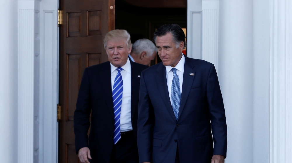 U.S. President-elect Donald Trump and former Massachusetts Governor Mitt Romney emerge after their meeting at the main clubhouse at Trump National Golf Club in Bedminster