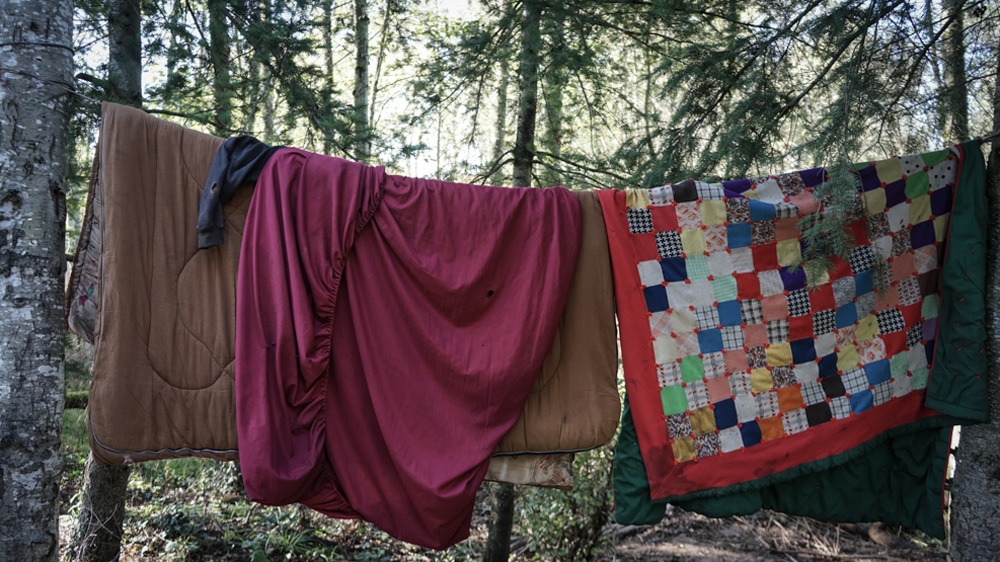 In cities across the US, laws that ban sleeping outside, camping in public places, begging and sleeping on pavements restrict the options available to the homeless   [Patrick Strickland/Al Jazeera]  