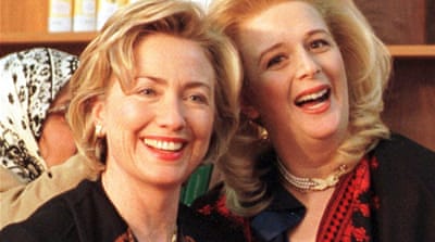 Hillary Rodham Clinton is pictured with Yasser Arafat's wife Suha at the Beach refugee camp in Gaza on December 14, 1998. [AP]