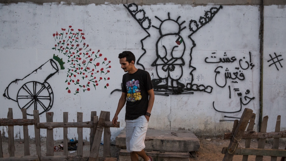 The 31-year-old, who has a master's degree in political philosophy, was one of only two people from his high-school graduating class to go to university [Ioana Moldovan/Al Jazeera]