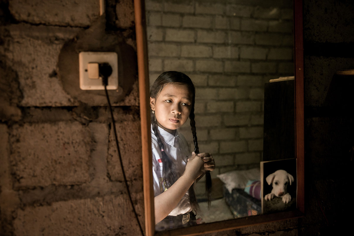 A Solo Balinese Girl Stray Dogs Rescuer/ Please Do Not Use