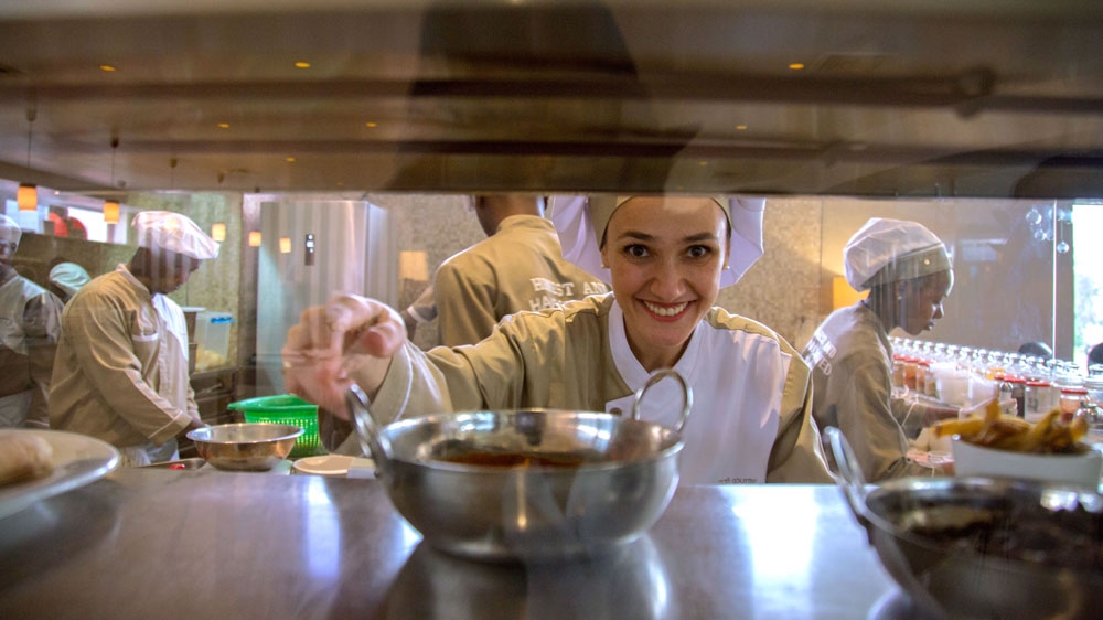 
'It's not easy to live in Nigeria. You are outside your comfort zone every day,' Loubna says [Andrew Esiebo/Al Jazeera] 
