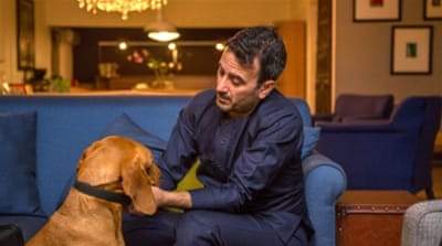 Eddie Bahnam originally intended to stay for three years. Fifteen years later, he is applying for citizenship [Andrew Esiebo/Al Jazeera] 