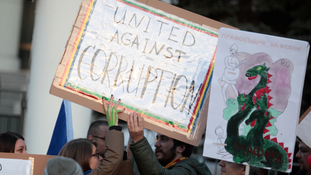 People gather in front of the Romanian Embassy to show solidarity with the mass anti-corruption protests in Romania, in Sofia