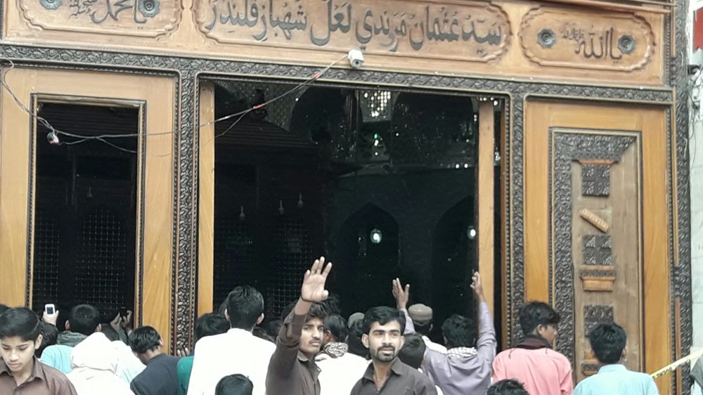 
Thursday's attack was the deadliest in Pakistan since 2014 [Wali Muhammed/Al Jazeera]

People arriving at the scene of the blast on Friday [Wali Muhammed/Al Jazeera]
