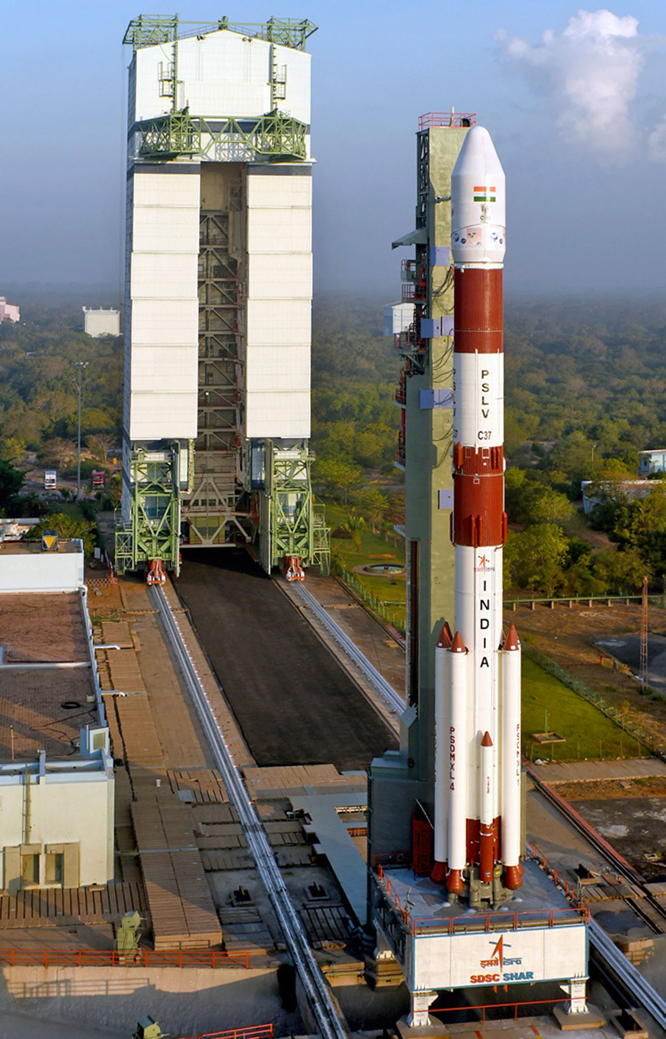 

Indian Space Research Organisation (ISRO) built the PSLV-C37 seen here with a Mobile Service Tower at the Satish Dhawan Space Centre in Sriharikota [EPA]

Indian Space Research Organisation (ISRO) built the PSLV-C37 seen here with a Mobile Service Tower at the Satish Dhawan Space Centre in Sriharikota [EPA]