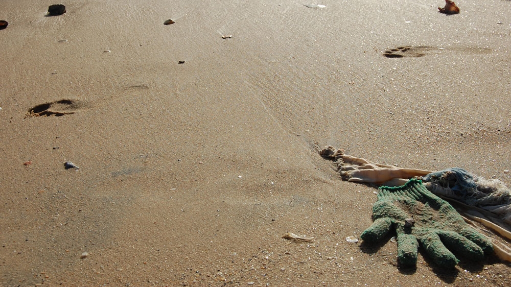  The detrimental impact of the clothing trade is visible on the delicate ecosystem of mangroves [Ndela Faye/Al Jazeera]