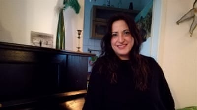 Simona Cannetti was one of the many people from outside the country drawn to Berlin after reunification  [Gouri Sharma/Al Jazeera] 