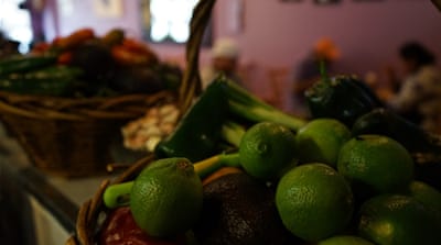 Chefs at La Morada use chili, lime and peppers to cook up authentic delicacies from Oaxaca, Mexico [James Reinl/Al Jazeera]