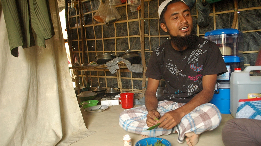 Hafiz Shafiq arrived in Bangladesh with his wife and seven-month old son [Naushad Ali Husein/Al Jazeera]