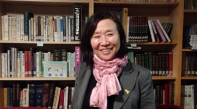 Han moved to West Berlin two years before the wall came down  [Gouri Sharma/Al Jazeera] 