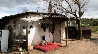 The building in which Faisal Razza and his workers live [Will Horner/Al Jazeera]
