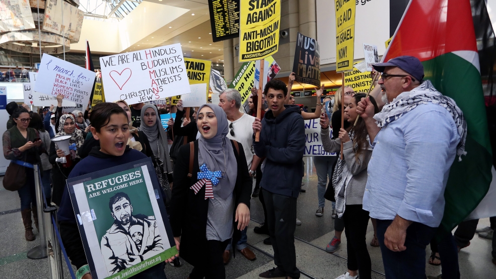 Federal judge halts President Trump''s ''Muslim ban'' executive order