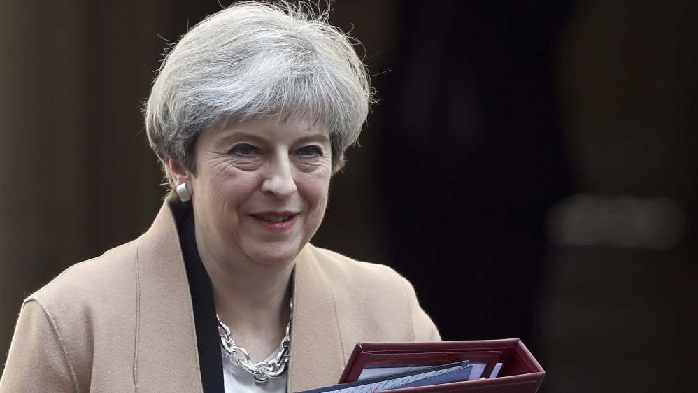 May said holding an election in June, rather than as scheduled in 2020, will give the country 'certainty and stability' as it negotiates its departure from the EU [Stefan Wermuth/Reuters]