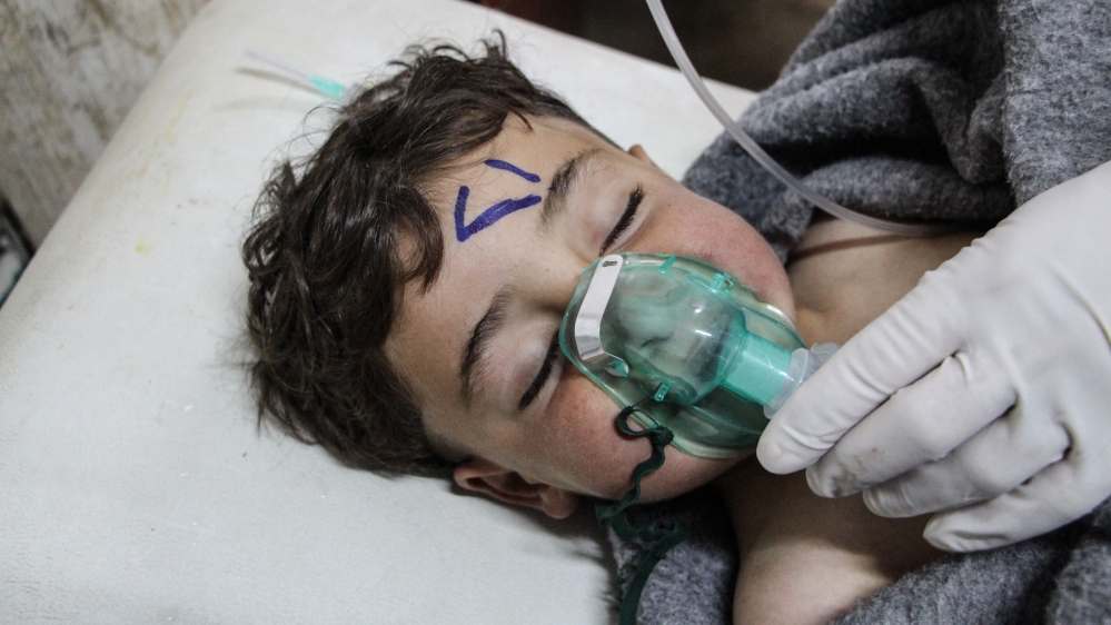 At least 58 killed in suspected gas attack in northern Syria, NGO