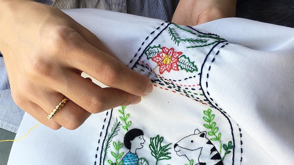 
Abed, Mariam's son, had one wish for the holidays: to have a tiger for a friend [Courtesy of the Ana Collection/Al Jazeera]
