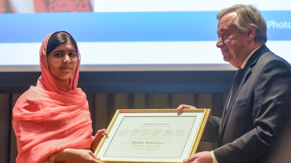 Malala Yousafzai attends a ceremony with United Nations Secretary General Antonio Guterres after being selected a United Nations messenger of peace in New York