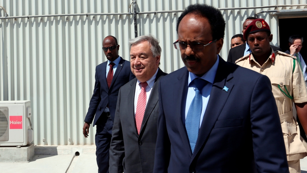 Guterres, centre, and Abdullahi discussed the national disaster [Mohamed Feisal Omar/Reuters]