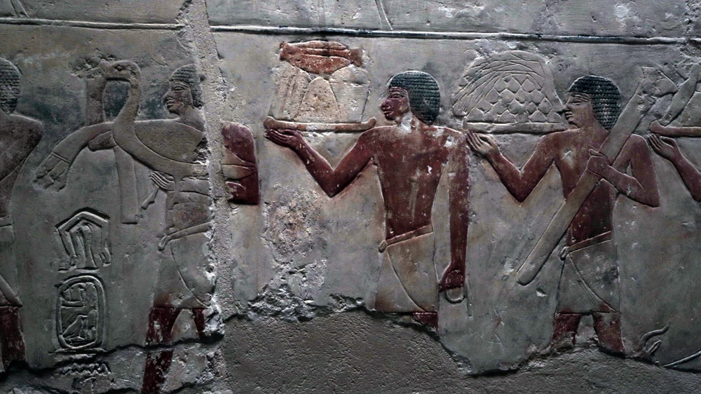 Ancient hieroglyphs found at the sublime necropolis of Saqqara appear to show the procession of a magnificent feast [Dorian Geiger/Al Jazeera]