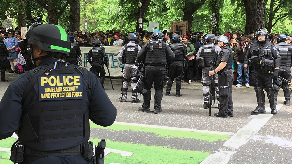 Security officers worked with local police to prevent major clashes [Mike Bivins/Al Jazeera]