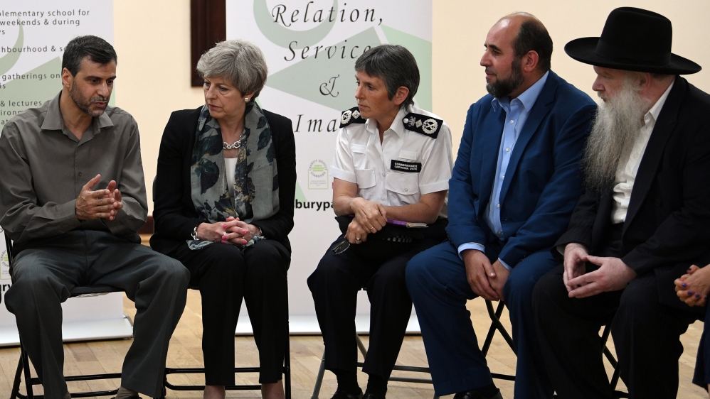 British Prime Minister Theresa May meets community leaders in Finsbury Park [Stefan Rousseau/Reuters]
