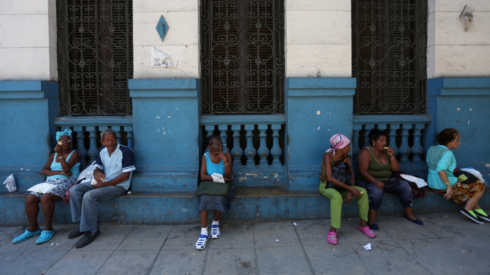 Vendors offer plastic bags for sale near a subsidized state store, or "bodega", where Cubans can buy basic products with a ration book they receive annually from the government, in Havana