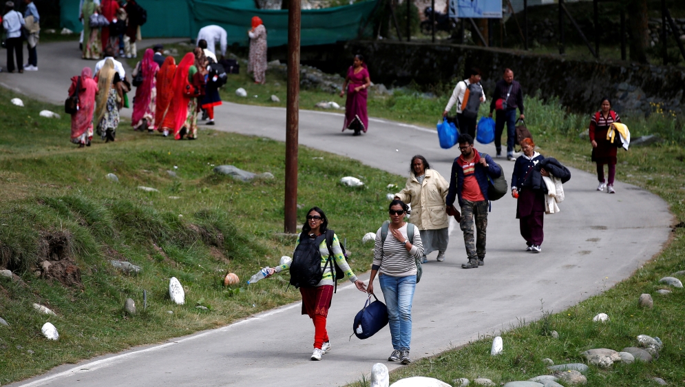 Hindu pilgrims flock to Pahalgam town in south Kashmir's Anantnag district to visit the Amarnath cave shrine [Reuters/Danish Ismail]
