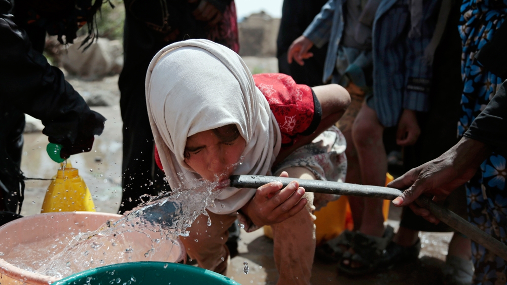 A girl drinks water from a well that is allegedly contaminated with cholera bacteria, on the outskirts of Sanaa, Yemen, Wednesday, July 12, 2017. The U.N. health agency said Tuesday that plans to ship cholera vaccine to Yemen are likely to be shelved over security, access and logistical challenges in the war-torn country. Yemen”s suspected cholera caseload has surged past 313,000, causing over 1,700 deaths in the world”s largest outbreak.