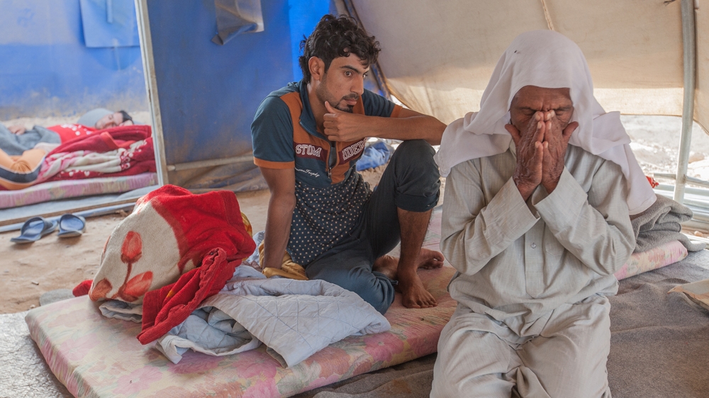 Jassim Muhammad Shwaish, 72, says he is being detained despite the fact that he faces no charges [Sebastian Castelier/Al Jazeera] 