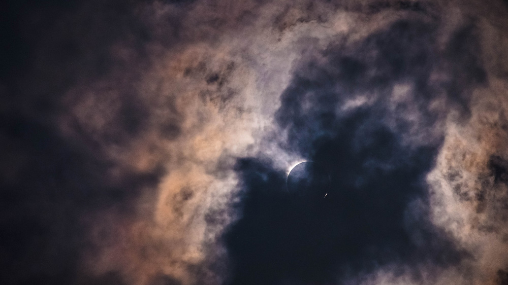 The sky had been perfectly clear all morning, but as noon approached, ominous clouds started forming in all the wrong places [Karim Haddad/Al Jazeera]