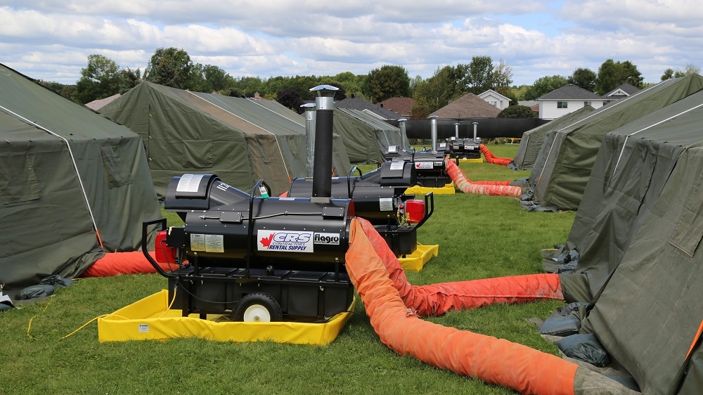 The Canadian military has set up a tent city in Cornwall, Ontario capable of housing 500 asylum seekers while they find more permanent accommodation [Blake Sifton/Al Jazeera]