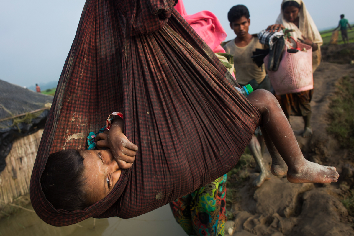 Rohingya Muslims fleeing violence.