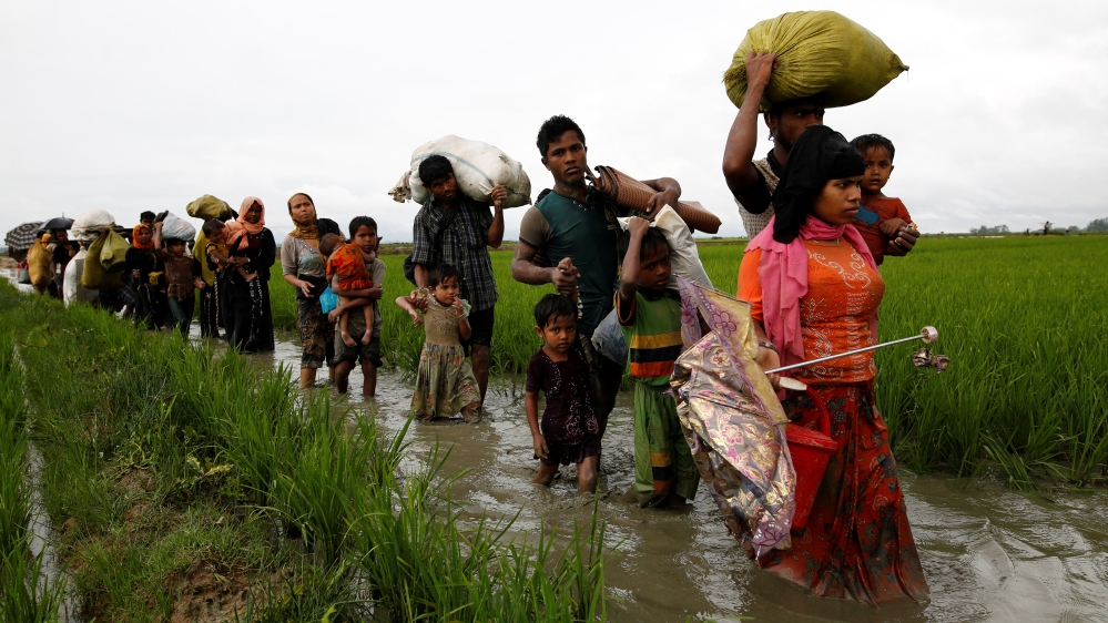 The violence has sent tens of thousands of Rohingya fleeing across the border into Bangladesh [Mohammad Ponir Hossain/Reuters]