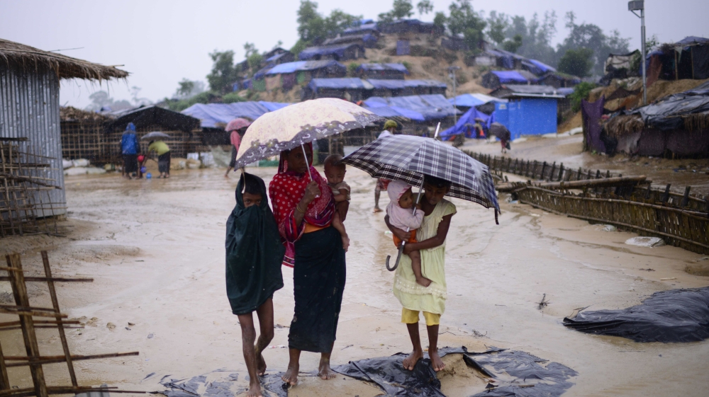 Distressed Rohingya have built shanties made of tarpaulin and bamboo sticks [Mahmud Hossain Opu/Al Jazeera]