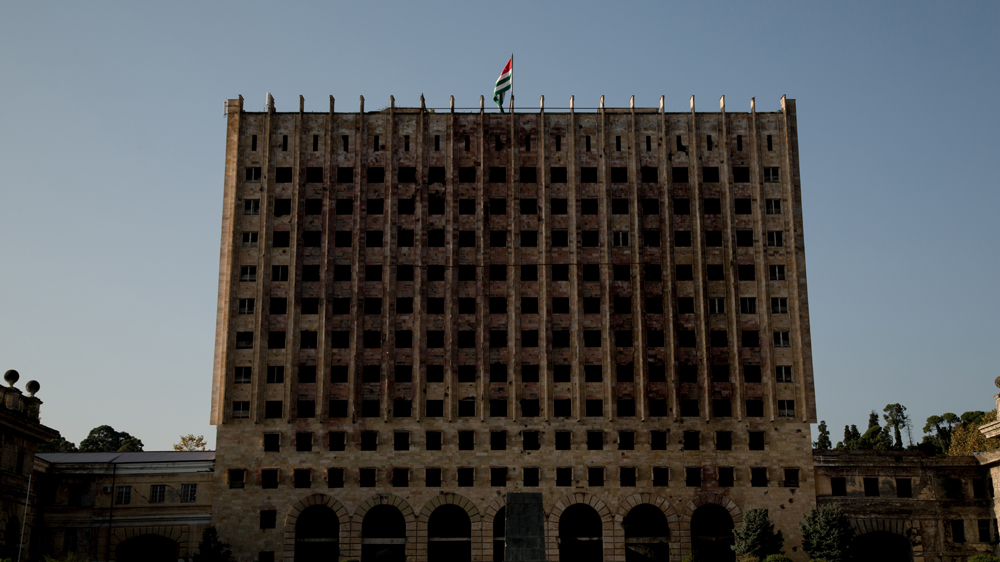 The former Parliament building in Sukhumi, damaged during the civil war with Georgia [Alice Aedy/Al Jazeera]