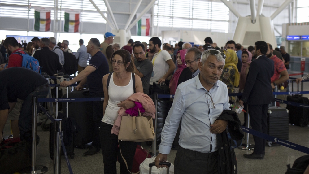 Many travellers boarded the last flights out of the cities of Erbil and Sulaymaniyah as an Iraqi government order to halt all international flights [AP]