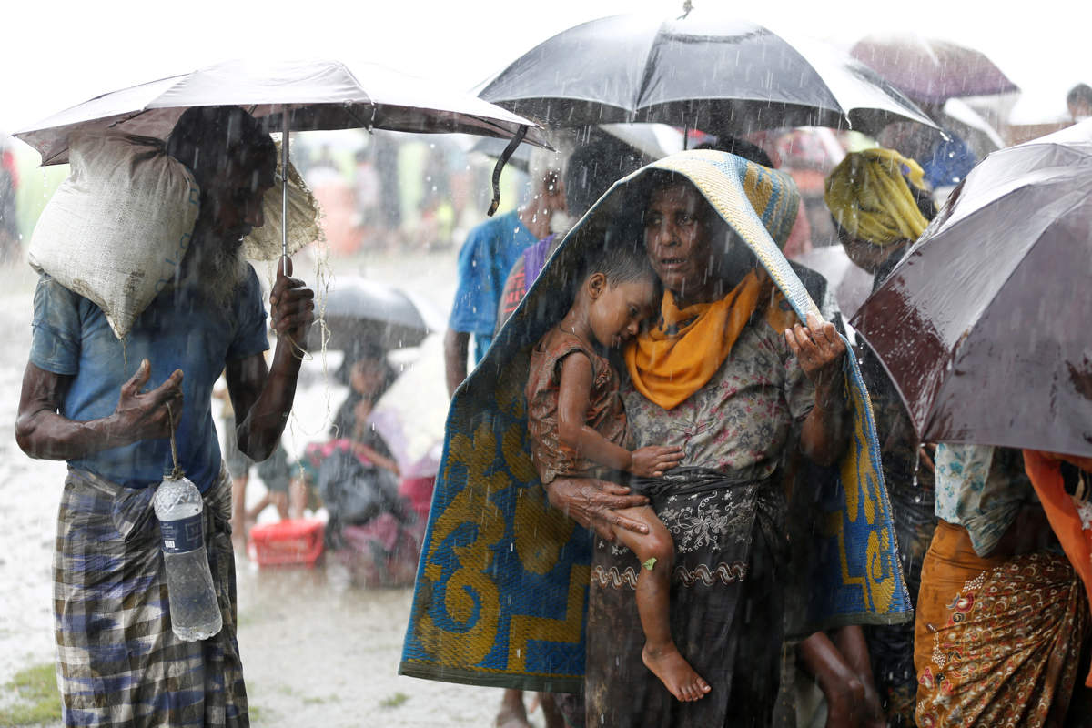 Rohingya Muslims fleeing violence.