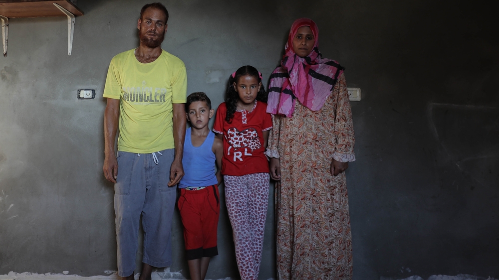 Ahlam, Malak's mother, says her daughter has been finding it difficult to interact with others [Ezz Zanoun/Al Jazeera]