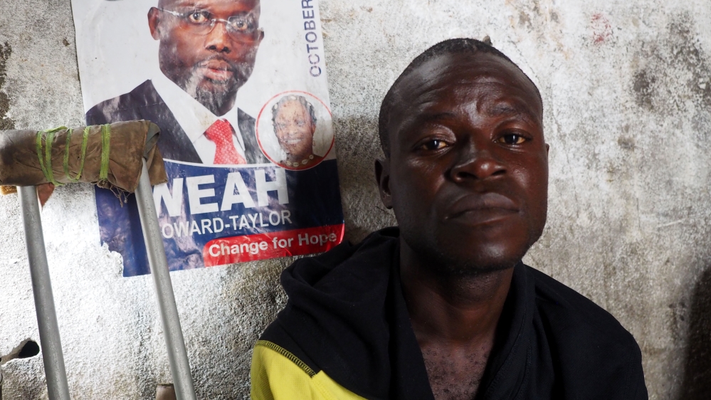Asaek Mark, 41, was recruited as a hungry child in the bush [Lorraine Mallinder/Al Jazeera]